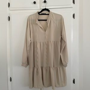 Used worn once nude dress. Size large